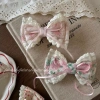 A sweet and girlish high ponytail hairpin with floral prints and a fresh pinkish-green flower bow with lace trim details Picture